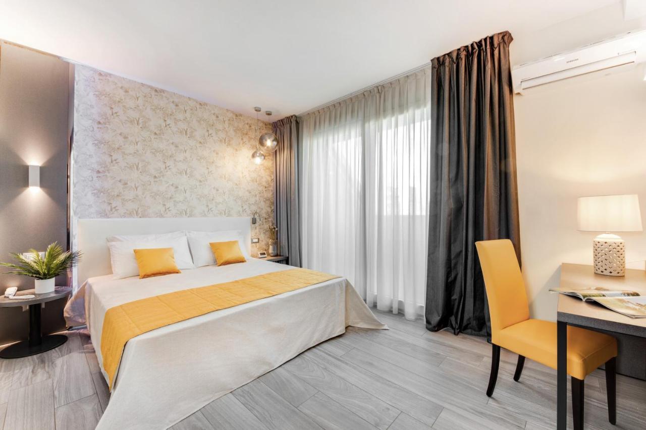 Romagna Suite Hotel กัตเตโออามาเร ภายนอก รูปภาพ